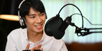Male podcaster Asian man podcasting